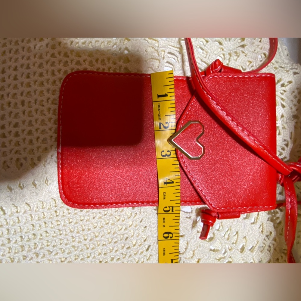 3/$15 Red faux leather crossbody with heart snap and clear back - Picture 5 of 10